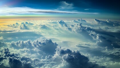 Fototapeta premium Stunning Aerial View of Fluffy White Clouds above Blue Sky