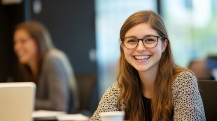 Fototapeta premium Happy female business professional with colleagues in meeting at office