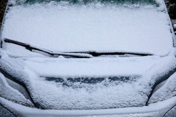 Snow-Covered RV Front in a Serene Winter Scene