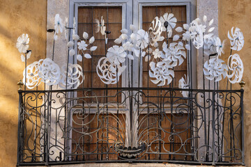 Christmas paper snowflakes decorating the facade of Casal Solleric, Paseo del Borne, Palma,...