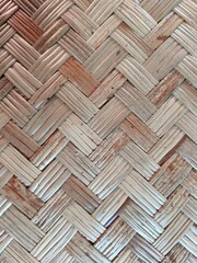 The woven wood seat is in cream, light brown and dark brown.