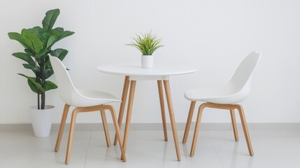 Modern Minimalist Dining Area with Round Table and White Chairs Surrounded by Greenery in Bright Room