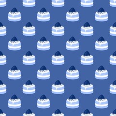 Mini cakes with sweet cream filling and strawberries on top