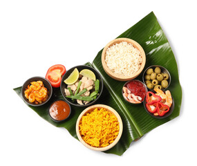 Piece of banana leaf with different food and sauce isolated on white, top view. Healthy eco serving