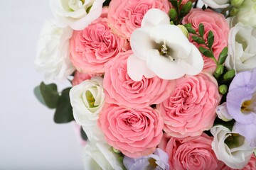 Beautiful wedding bouquet on light background, closeup