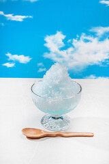 かき氷　cold dessert shaved ice with blue syrup