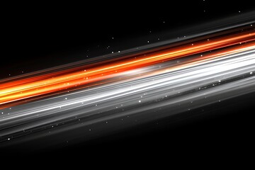 Abstract diagonal light streaks on black background.