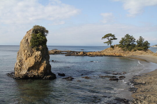 Standing Giant Rock at Tateishi Coast under Bright Cloudy Sky in Yokosuka, Japan