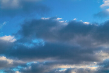 Winter blue sky and cloud. Calm clear winter air background. The sky blue texture clouds. Blue sky and White cloud nature background.
