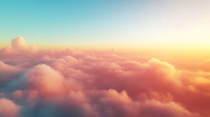 Obraz premium Aerial sunset view above fluffy clouds.