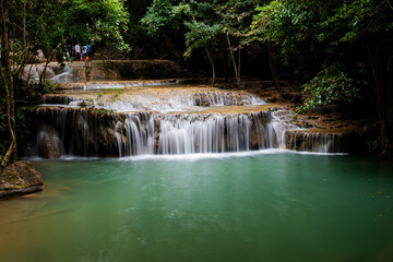 Beautiful and amazing Erawan waterfall in tropical forest of national park, Kanchanaburi, Thailand.