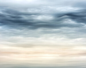 Obraz premium Serene, layered cloudscape; dramatic sky texture; atmospheric, calming, moody, ethereal, peaceful, tranquil, dreamy clouds.