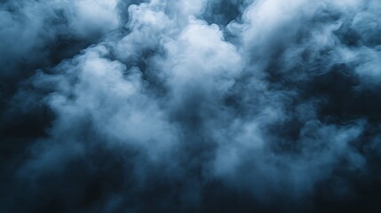 Obraz premium Dense blue smoke clouds on black background.