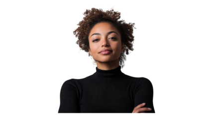 Confident woman with curly hair wearing a black turtleneck sweater, posing against a neutral background.