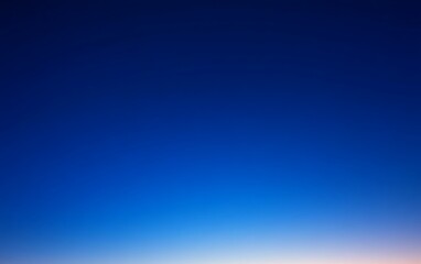 Deep blue twilight sky gradient.
