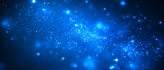 Fototapeta premium Blue abstract glittering particles background.