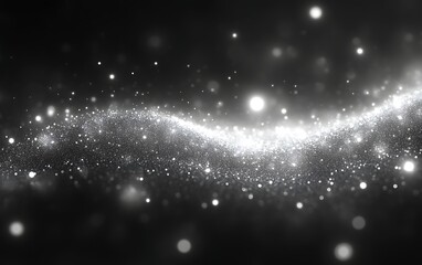 Obraz premium Abstract grayscale wave of glowing particles on black background.