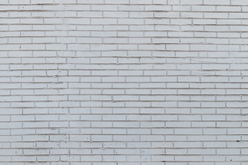an old brick wall, painted white. the textured pattern. background for design, close-up