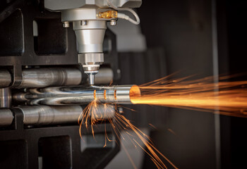 CNC Laser and gas cutting of metal, modern industrial technology.