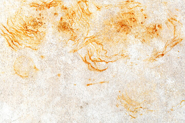 Dirty  old tile with yellow brown stain. Grunge and rough surface. 