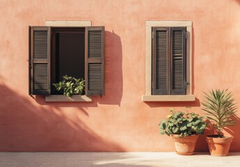 Two windows with shutters on a pink wall