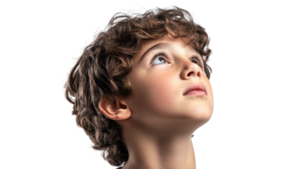 A Young Boy Displaying Intense Concentration While Engaged in a Challenging Activity, Perfect for Representing Focus and Determination in Education or Creative Pursuits.