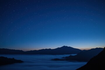 The sky is dark and the stars are shining brightly