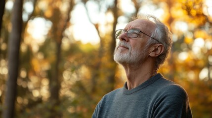An older man doing deep breathing exercises outdoors