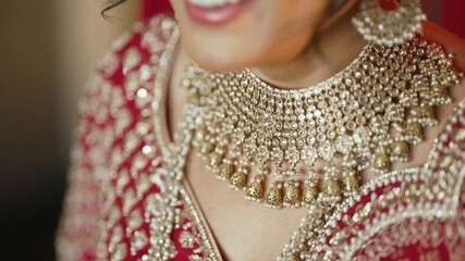 Camera pan over beautiful Gold necklace pakistani bridal getting ready her wedding day, bride wearing
