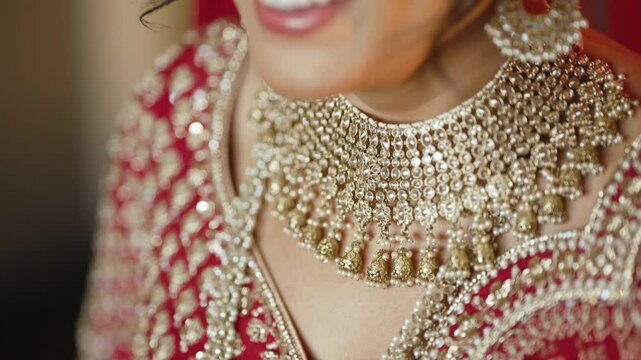 Camera pan over beautiful Gold necklace pakistani bridal getting ready her wedding day, bride wearing