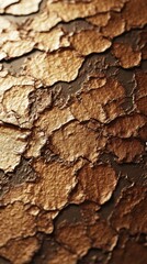 Close-up of textured, metallic surface resembling cracked bronze or gold.