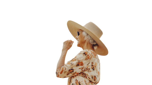 Portrait of an elderly woman wearing a stylish summer dress with a wide-brimmed hat, ideal for illustrating themes of elegance, summer activities, and generational wisdom..