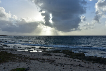 Amazing Rays of Sun Shining Through Clouds on Ocean