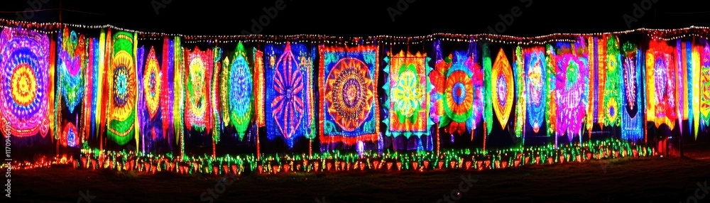 Poster a vibrant display of colorful lights arranged in intricate patterns for festive decoration.