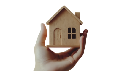Hand Holding a House Isolated on Transparent Background for Real Estate and Home Ownership Promotion.
