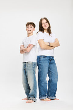 Studio portrait of two teenage kids.