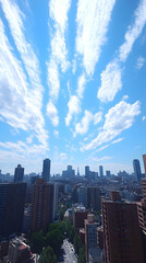 Obraz premium Cityscape Photo: Blue Sky, Fluffy Clouds