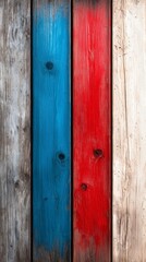 Fototapeta premium A close up of a wooden wall with red, white and blue paint