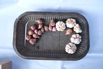 Fresh Red Onions and Garlic on Rustic Tray for Culinary Mockup