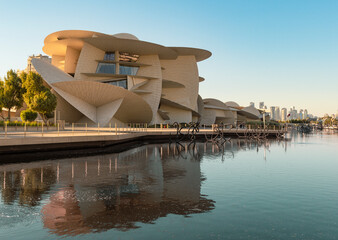 National Museum in Doha, Qatar with a wide angle view of the pool in its garden