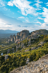 Naklejka premium Monastery Perched on Steep Rock Formation