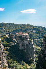 Fototapeta premium Monastery Perched on Steep Rock Formation
