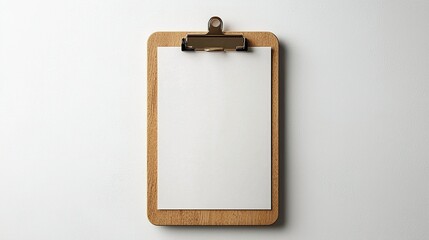 Blank paper on wooden clipboard, white background, overhead view, for notes/lists.
