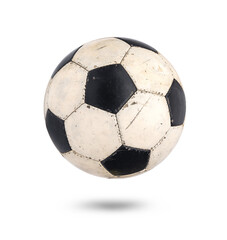 Old Soccer ball with wear and tear from play. Classic black and white football floating with soft shadow isolated on white background.