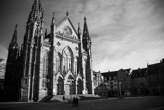 Mulhouse - France - 1 january 2025 - view of the st etienne protestant temple on empty place on black and white photography