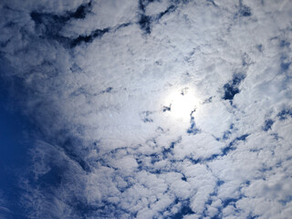 Fototapeta premium Serene Cloudscape Illuminated by Sunlight