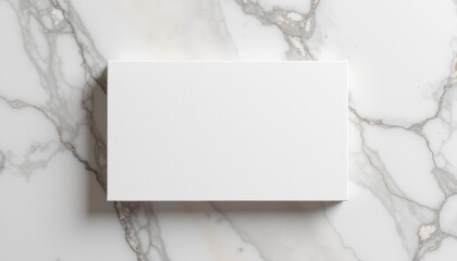 A business card with a marble effect, centered on a polished marble surface, neutral tones, simple and refined