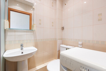 modern bathroom room with toilet and washing machine