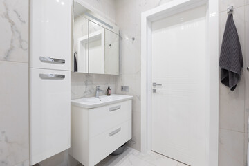 modern bathroom room with toilet and washing machine