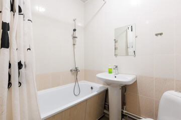 modern bathroom room with toilet and washing machine